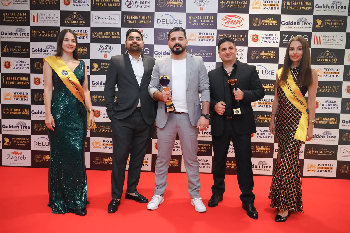 Winners celebrating at the Golden Tree Awards gala